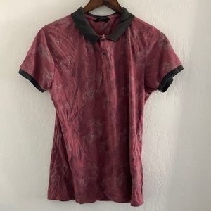 Maroon polo shirt w dragon embodiments